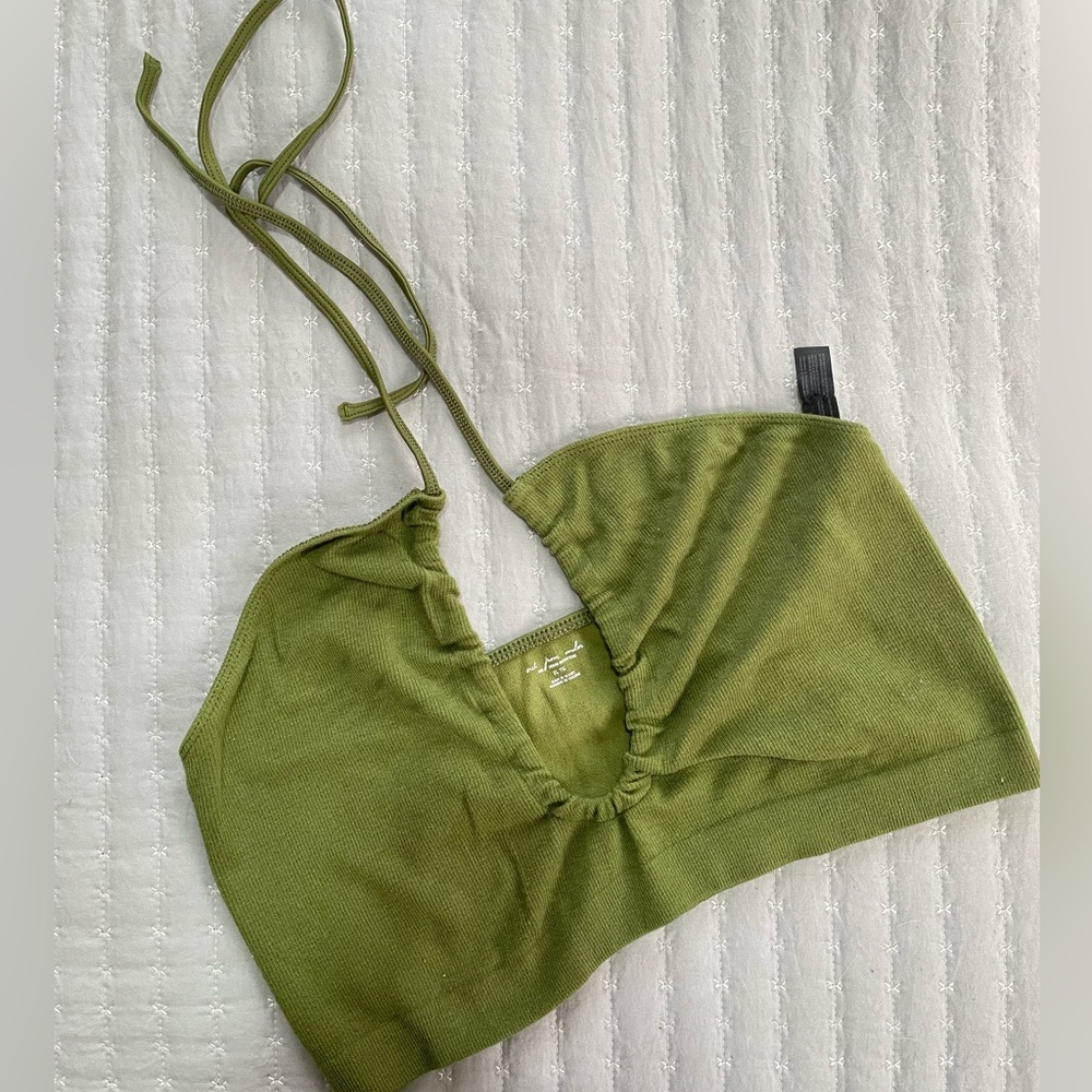 Out from under green crossover tie top